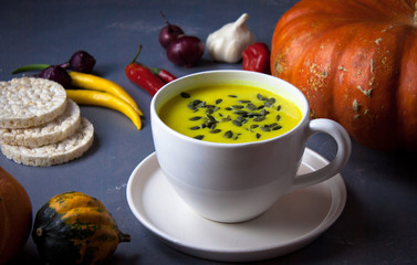 Pumpkin asian coconat cream soup. Autumn hot food