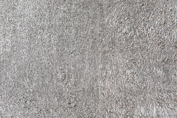 Silver background of metal foil, decorative texture