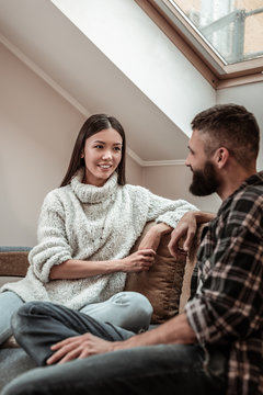 Positive Nice Young Couple Having A Conversation