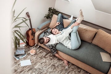 Top view of a happy young couple