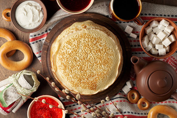 Shrovetide Maslenitsa Butter Week festival meal. Stack of russian pancakes blini