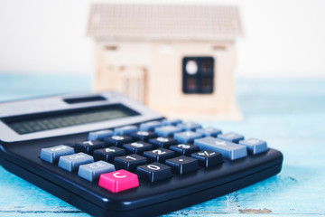 calculator with house model