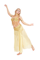 Beautiful blonde bellydancer in golden-yellow costume over white background