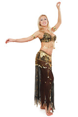 Beautiful blonde bellydancer in golden-black costume over white background
