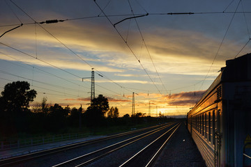Fototapeta na wymiar sunset sky at the train station summer