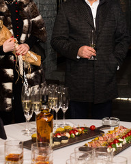 Men and woman drinking