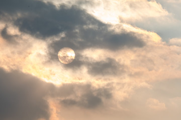 Full sun and clouds in the sky