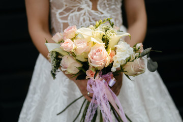wedding bouquet in bride's hands