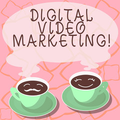 Conceptual hand writing showing Digital Video Marketing. Business photo showcasing uses of video contents to promote a brand or product Cup Saucer for His and Hers Coffee Face icon with Steam