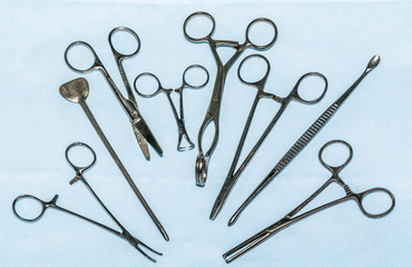 Fototapeta premium Sterilization of medical instruments. Steel Surgical Scissors and Clamps