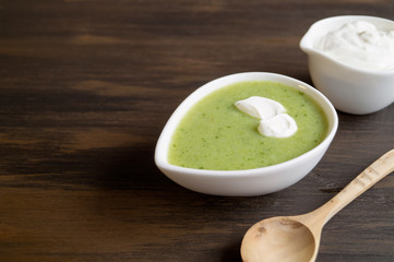 Vegetarian spinach soup in a white plate.