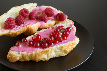 Croissants with jam and berries for Breakfast.