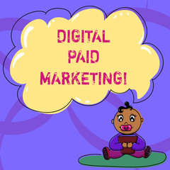 Writing note showing Digital Paid Marketing. Business photo showcasing marketing efforts that involve a paid placement Baby Sitting on Rug with Pacifier Book and Cloud Speech Bubble