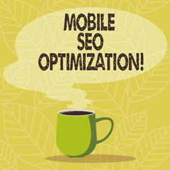 Conceptual hand writing showing Mobile Seo Optimization. Business photo showcasing enables a website to rank for mobile searches Mug of Hot Coffee with Blank Color Speech Bubble Steam icon