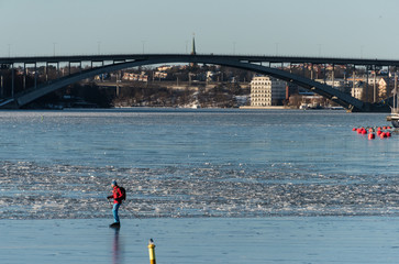Bridges and frozen lakes at the waterfront in Stockholm a Sunny Winter Day