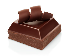 Chocolate pieces with chocolate shavings on white background