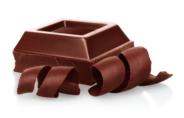 Chocolate pieces with chocolate shavings on white background