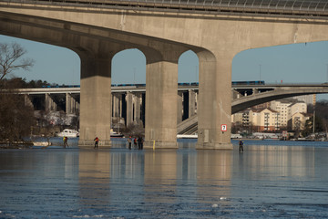 Bridges and frozen lakes at the waterfront in Stockholm a Sunny Icy Day
