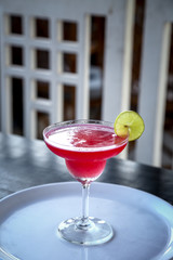 Fresh juice on white plate and waiting for serve