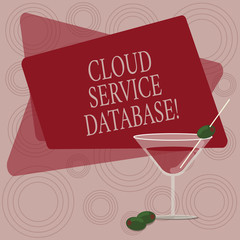 Writing note showing Cloud Service Database. Business photo showcasing optimized virtualized computing environment Filled Cocktail Wine Glass with Olive on the Rim Text Space