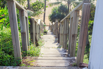 A wooden stairway to the sea. Afternoon beach bright at Nai Thon Beach Phuket Thailand