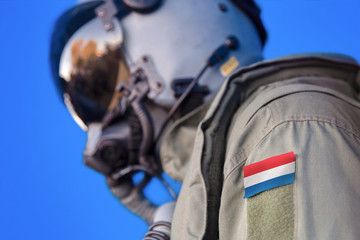 Air force pilot flight suit uniform with Netherlands flag patch. Military jet aircraft pilot	