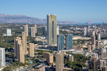Aerial photo showing the whole of Benidorm in Alicante, you can see everywhere included Playa de Levante beach, Balcón del Mediterráneo and all the high rise hotels.