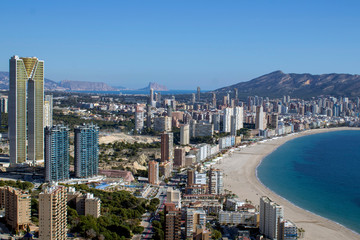 Naklejka premium Aerial photo showing the whole of Benidorm in Alicante, you can see everywhere included Playa de Levante beach, Balcón del Mediterráneo and all the high rise hotels.