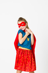 pretty blonde supergirl with red mask and red cape