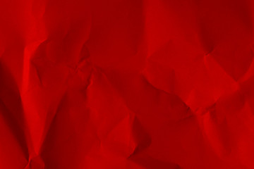 Texture of old red crumpled paper cardboard for background
