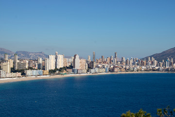 Fototapeta premium Aerial photo taken in Benidorm in Spain Alicante, showing the beautiful beach of Playa Levante and hotels, buildings, and high rise skyline cityscape.