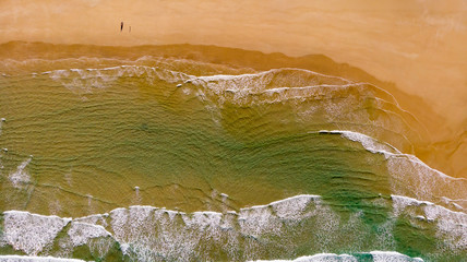 Beautiful aerial view of a beach with waves