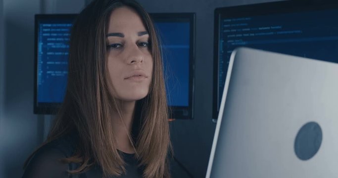 Close up face of Young Woman at binary code background