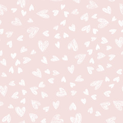 Holiday doodle Lovely Valentines Day background seamless pattern with cute hand drawn white hearts on pink background. Vector illustration.