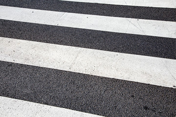 detail of pedestrian crossing marker at street scalled zebra strip