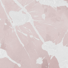 Luxury rose gold and white metal paint splatter effect on watercolor paper background. Pink gold glitter splash texture. Beautiful feminine backdrop.