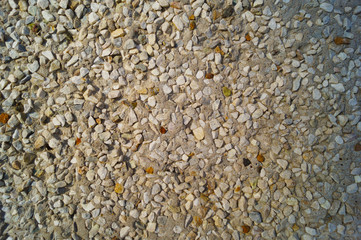 background of stone and rubble on the concrete wall