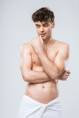 handsome shirtless thoughtful man isolated on grey