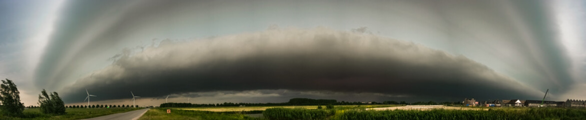 Panorama of an impressive shelf cloud over the western part of The Netherlands.  Impressive storm structure in the early morning of May 29th 2017.