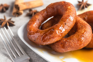 Peruvian classic dessert, picarones with honey