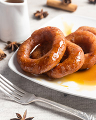 Peruvian classic dessert, picarones with honey