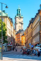 Rolgordijnen St. Nicholas church tower and narrow streets of Gamla Stan (old town), Stockholm, Sweden © Mistervlad