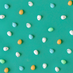 Easter colorful eggs on green background, toning