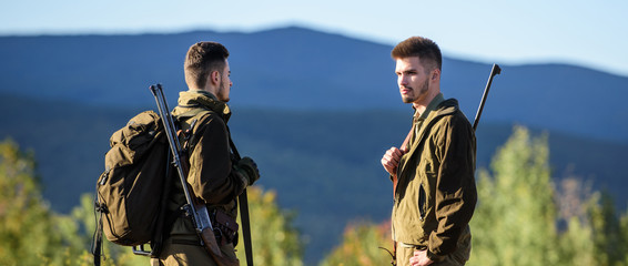 Friendship of men hunters. Military uniform fashion. Army forces. Camouflage. Hunting skills and...