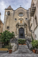 Carved Baroque portal of Santo Stefano Church also known as church of Purgatory (Chiesa del Purgatorio, 1668) at Piazza Giovanni in Cefalu, Sicily, Italy.