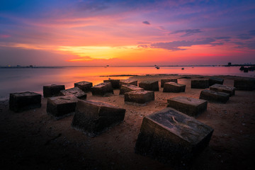 box concrete  at sunset on beach