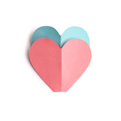 Paper hearts isolated on white background. Pink and blue hearts cut from paper. Flat lay. Top view