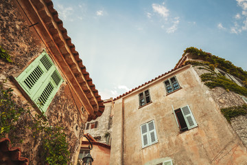 Vintage stylized photo of old living houses in Eze