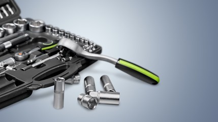 Metal wrench tools on background