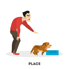 Man training his pet dog. Place command